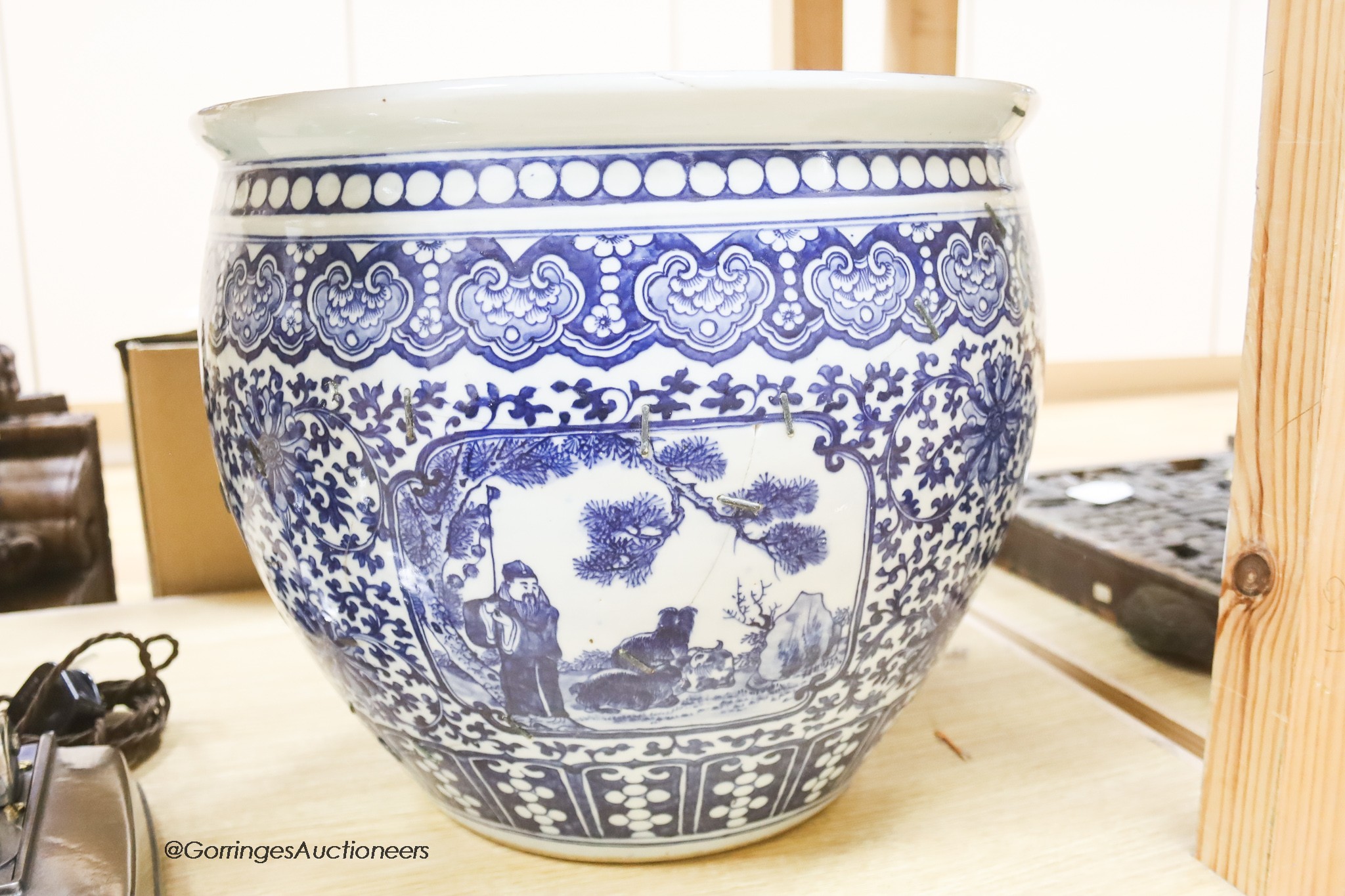 A 19th century Chinese blue and white jardiniere, height 34cm